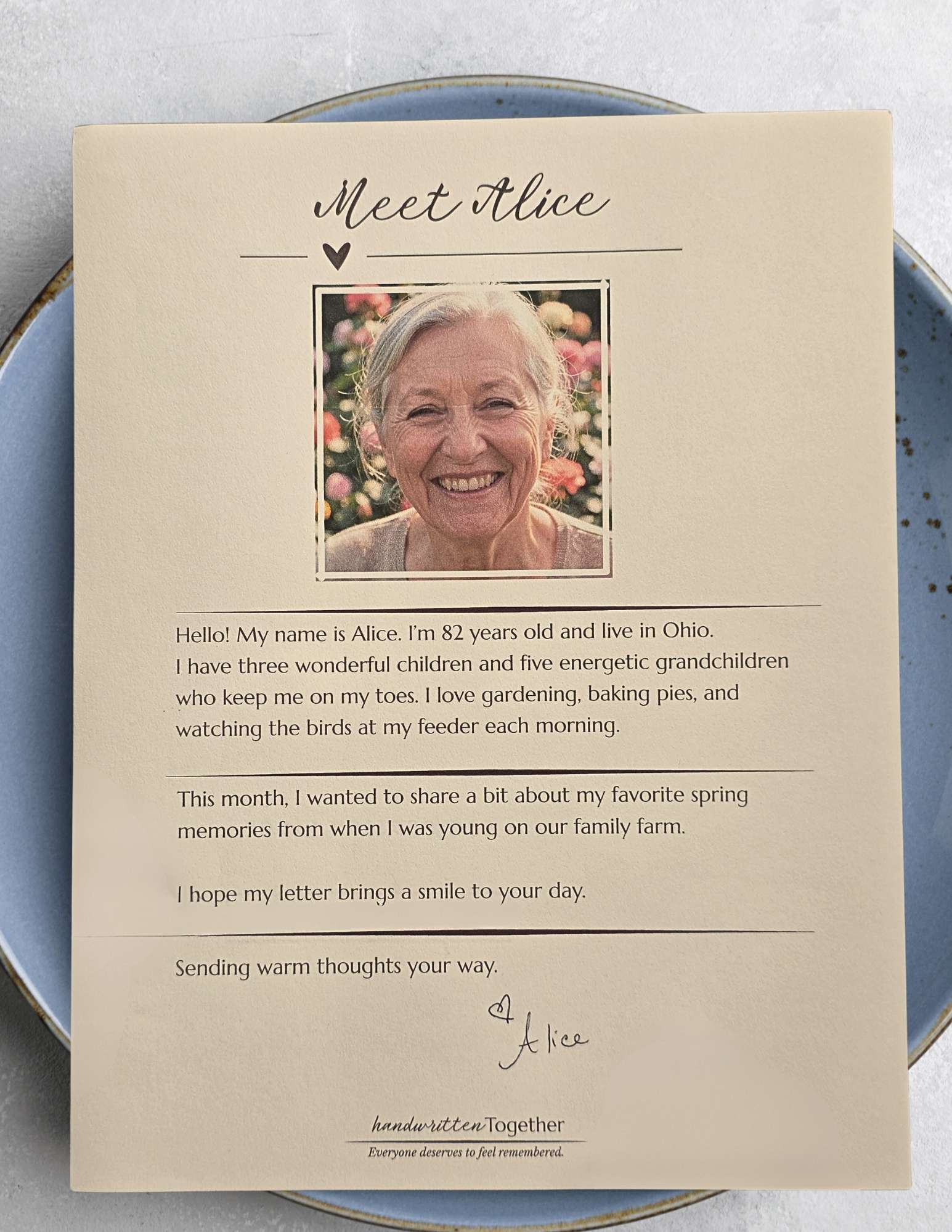 A printed biography card featuring a portrait and background story of this month's featured letter writer.